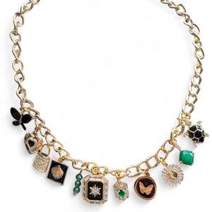 Gold Charm Necklace with Black and Green Accents